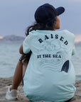 Camiseta Azul Pastel "Raised By The Sea"